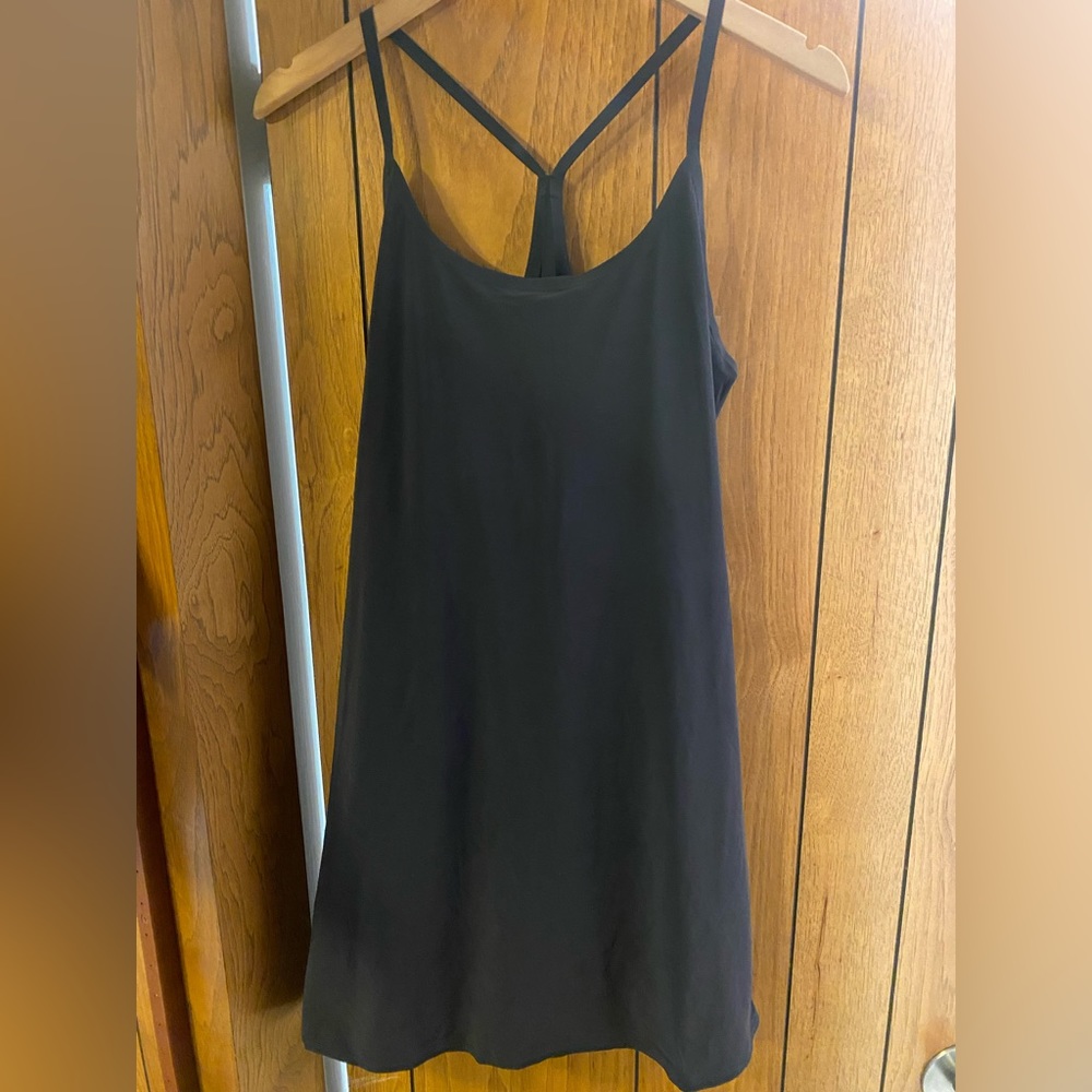Outdoor Voices black exercise dress, size Large. Never worn. Built-in shorts.